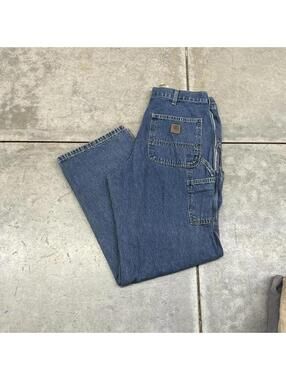 vintage carhartt dark blue relaxed baggy fit dungaree carpenter jeans 34 x 30